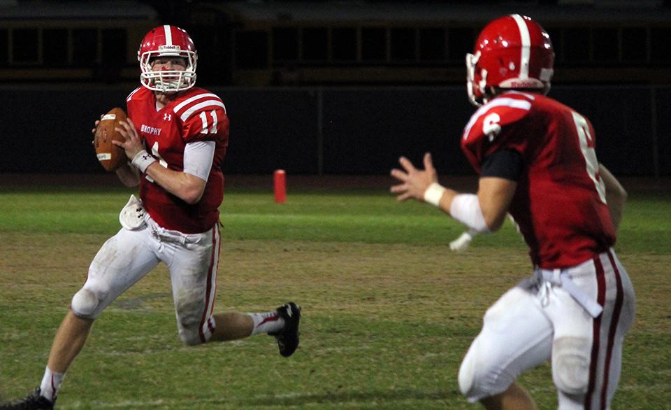 Photo by Devin McManimon McNally 17
Brophys Cade Knox 16, left, looks downfield to Noah Pittenger 17 Friday, Oct. 10 against Mountain Pointe. Brophy defeated Mountain Pointe 31-28.