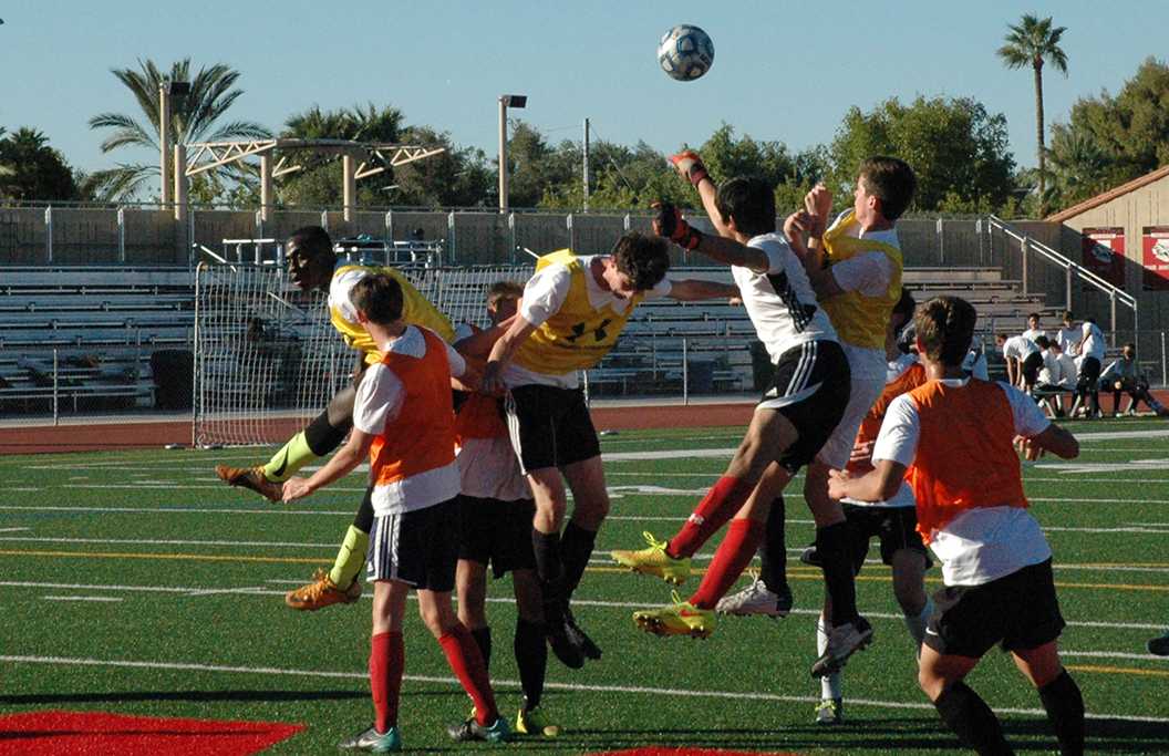 Photo by Cory Wyman '16 | The Varsity Soccer team plays a scrimmage match Nov. 16 after school at the Brophy Sports Campus during the last day of tryouts.