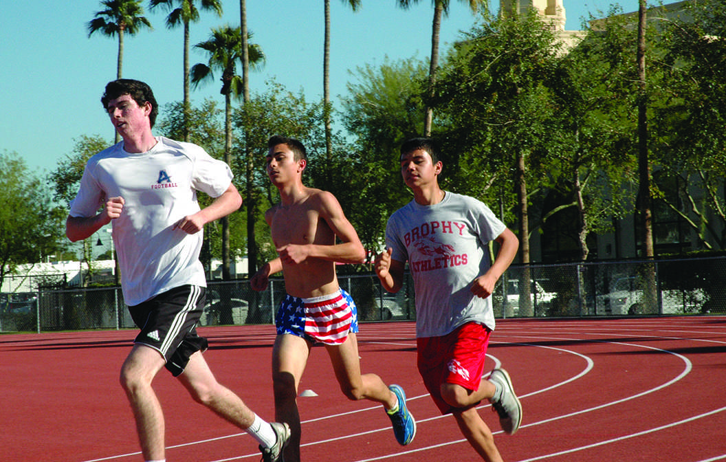 Photo by Cory Wyman 16 - Long Distance Track runners tryout for the team, Feb. 9.