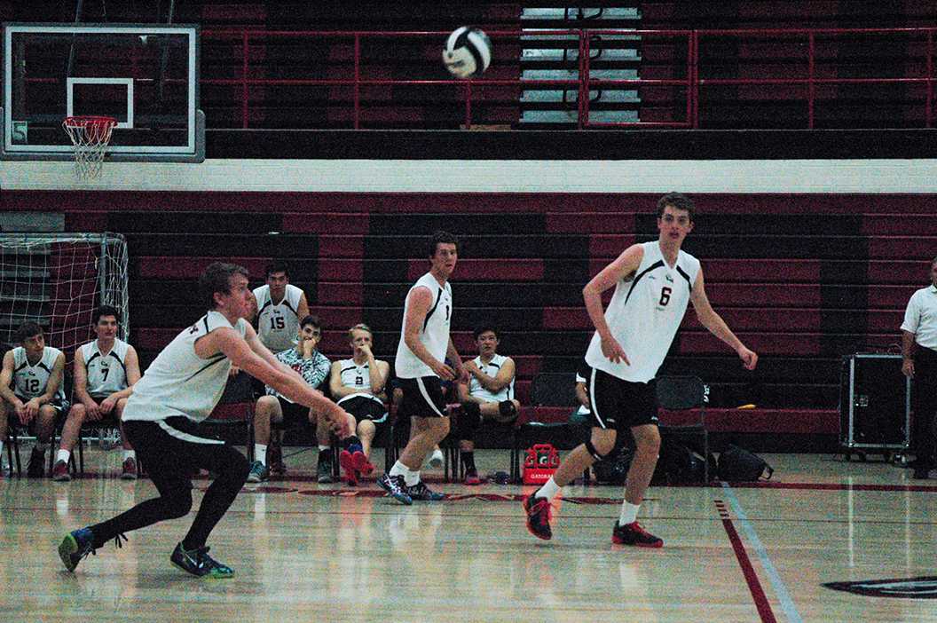 Photo by Cory Wyman '16 - Jack Rauch '16 prepares to hit the ball, preventing it from touching the ground. Varsity Volleyball played Kellis, April 14, winning with a score of 25-4, 25-13, and 25-15.