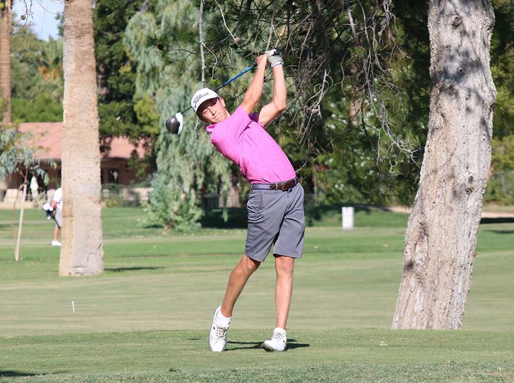 Photo by Bryce Owen ’17 | Tony Hendricks ’19 tees off at team practice at Phoenix Country Club.