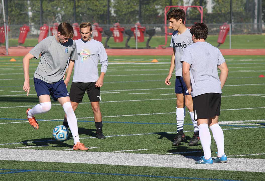 Photo by Bryce Owen ’17 | The Brophy soccer team practices during 7th period at Brophy Sports Complex.