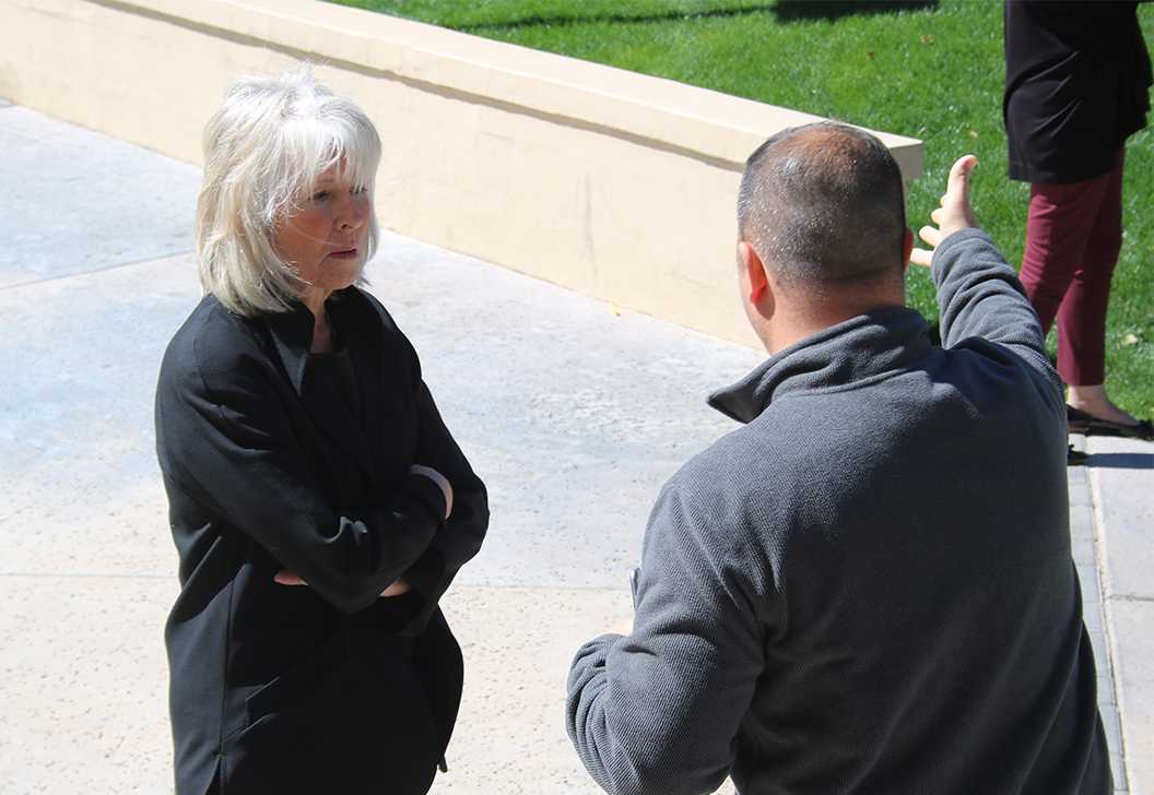 Photo by Bryce Owen ’17 | President Ms. Adria Renke speaks with Mr. Paul Fisko outside the Robson gymnasium March 6. Ms. Renke was named the first female President in Brophy’s history.