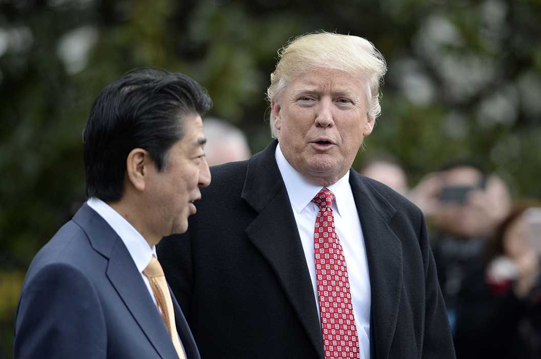 Photo Courtesy of Tribune News Service | President Donald Trump and Japanese Prime Minister Shinzo Abe depart the White House on Feb. 10, 2017 in Washington, D.C.