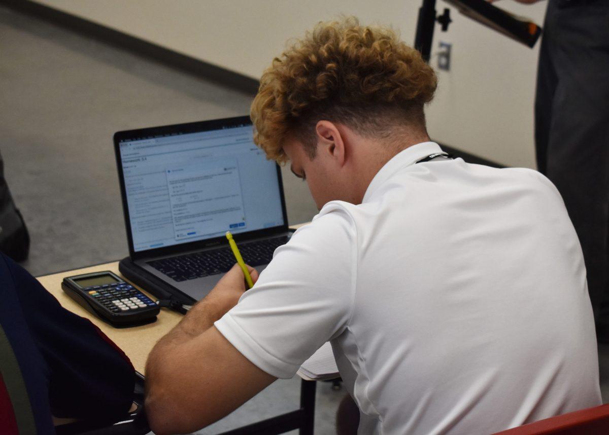 Photo by Nick Pecora ’21

A student works through practice problems while Mr. Doug Cox gives a supplemental lecture in his Pre-Calculus class on Nov. 7, 2019. These problems would be completed as homework in a traditional classroom setting. Photo credit: Nick Pecora