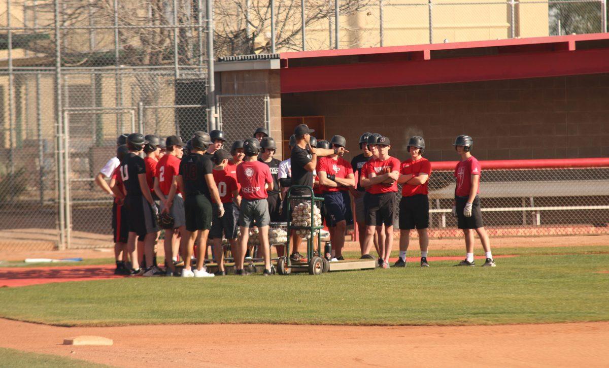 Head baseball coach Mr. Josh Garcia 07 instructs the team during afternoon practice on Jan. 14, 2020. Photo credit: Nick Pecora