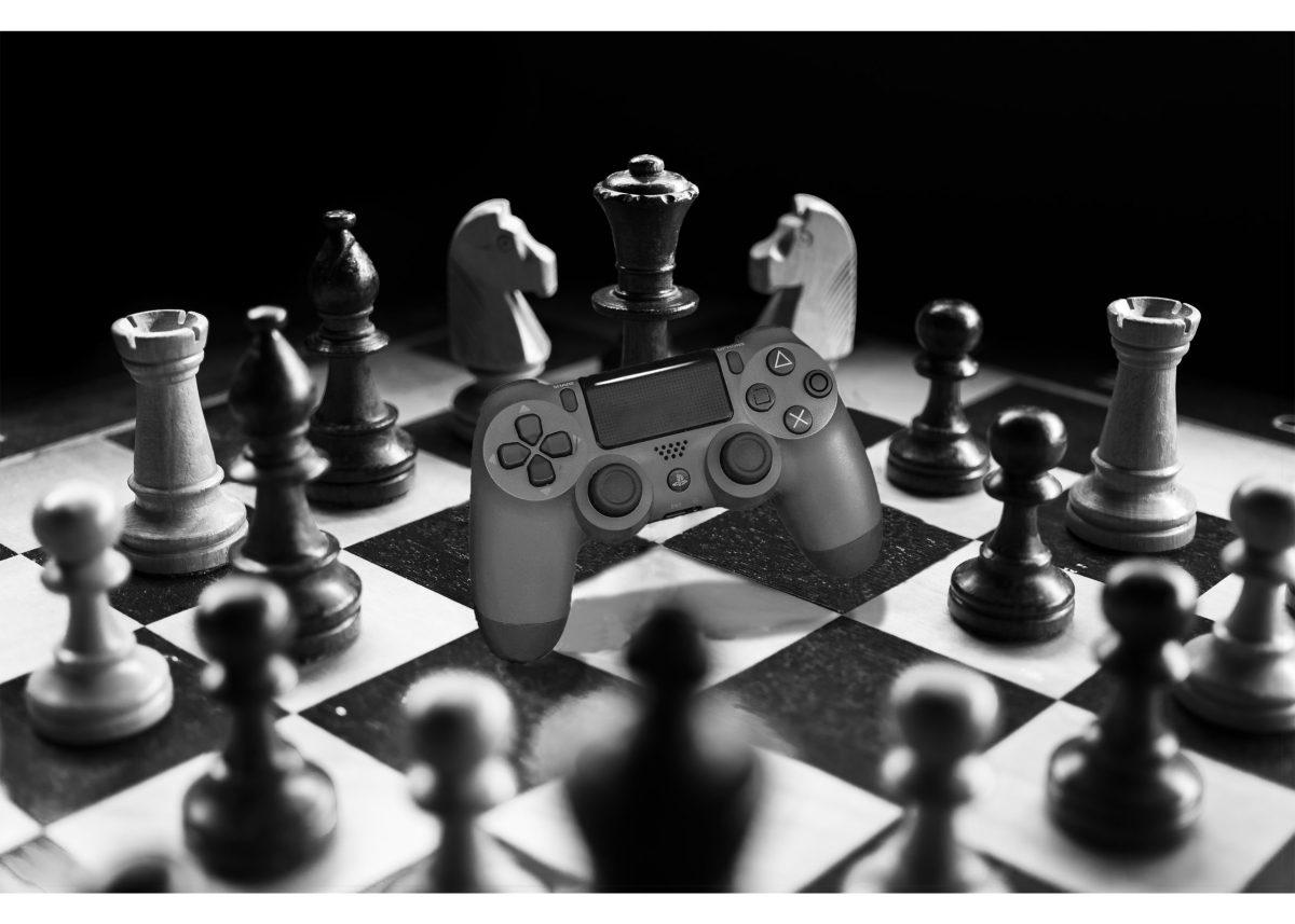 A chess board with a controller replacing a fallen chess piece shows their similarities.
A photo composite by Garret Van Wie 22