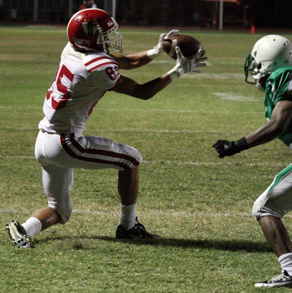 Photo by Rob March '11 - Devon Allen '13 catches a touch down pass in the fourth quarter against St. Mary's Sept. 10.