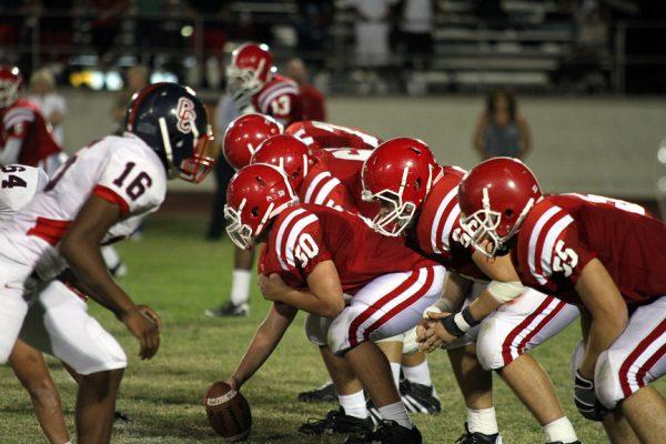 Photo by Ben Jackson ’11 The Brophy offensive line weathers a physical onslaught every game but accept their role as the rarely acknowledged anchor of the offense.