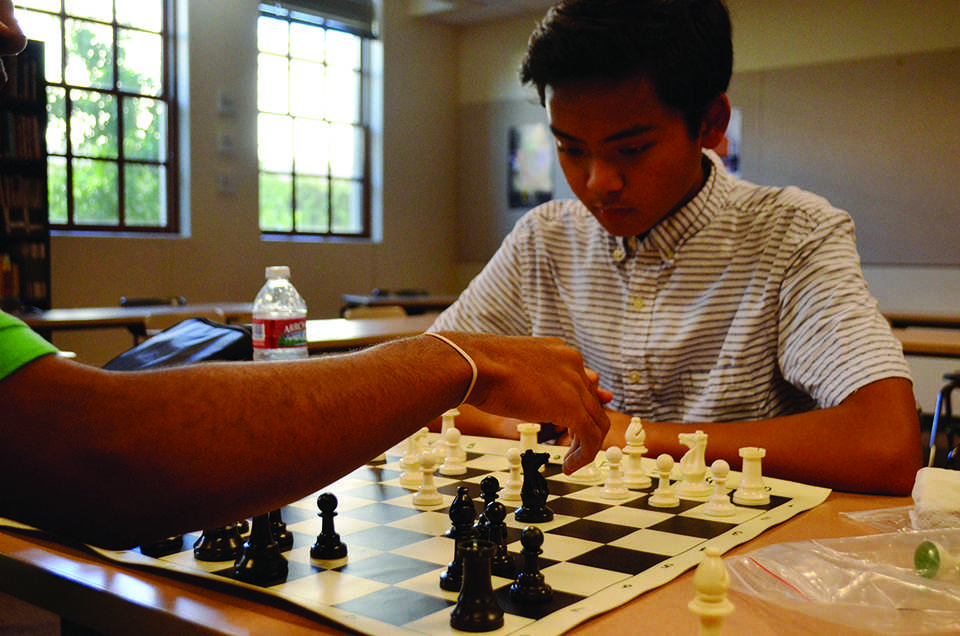 Photo+by+Alec+Vick+15+--+Two+freshman+students+play+chess+during+their+lunch+break+in+Mr.+Mars+room+as+a+part+of+the+chess+club.