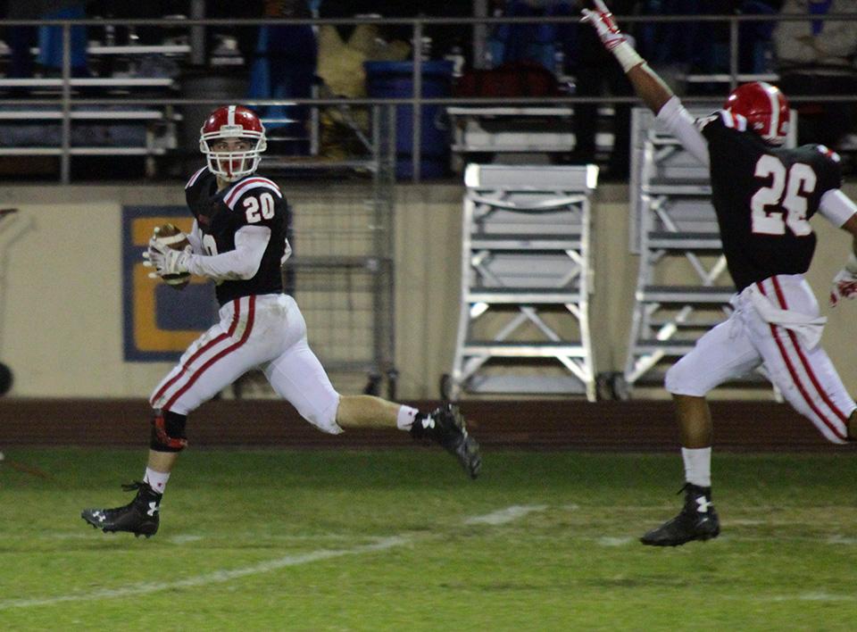 Photo by Matthew Montes 15 | Brophys Jack Haddon 15 runs a blocked kick in for a touchdown Nov. 14. Brophy defeated Desert Ridge 21-7 in the quarterfinal round of the state playoffs.