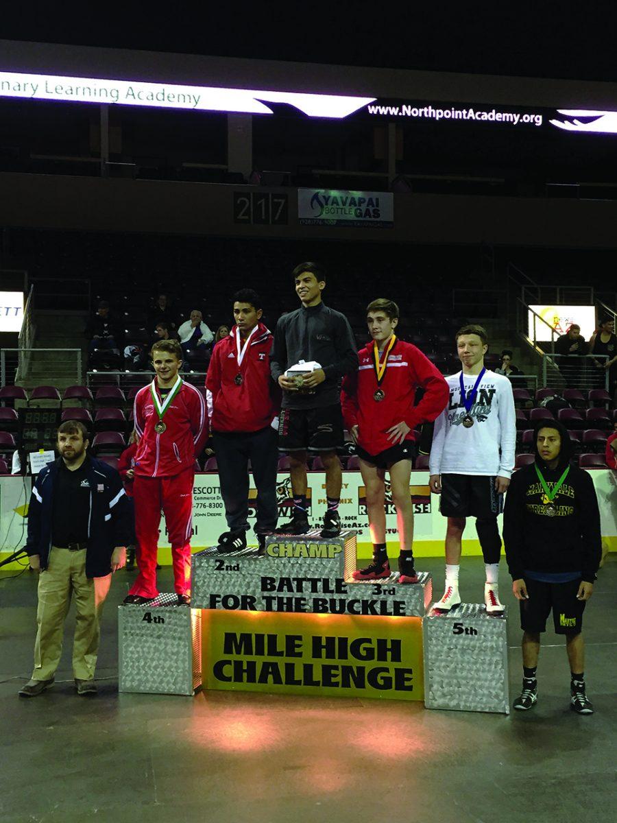 Photo courtesy of Brophy Wrestling -- The Varisty wrestling team traveled to the Mile High Challenge in Prescott Valley. Keenan Woodburn 15 (pictured) took home 4th place at the event.