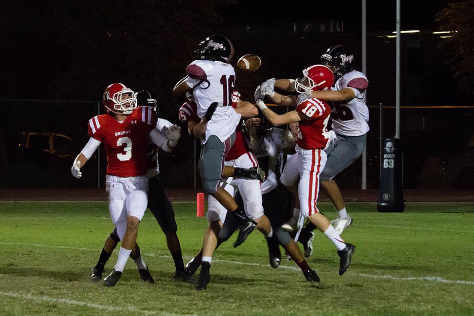 Photo+by+Noah+Rodriguez+17+%7C+Brophy+and+Desert+Ridge+plays+leap+for+a+pass+near+the+endzone+Sept.+25.+Desert+Ridge+defeated+Brophy+30-20.