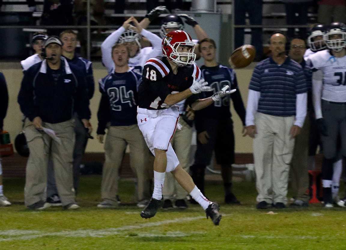 Photo by Michael Placenti 19 | Gabe Mendoza 16 makes 97-yard flea-flicker touchdown catch Nov. 6 to give Brophy a lead over Pinnacle. Brophy defeated Pinnacle 38-37 in double overtime in the first round of the 2015 Division 1 state playoffs.