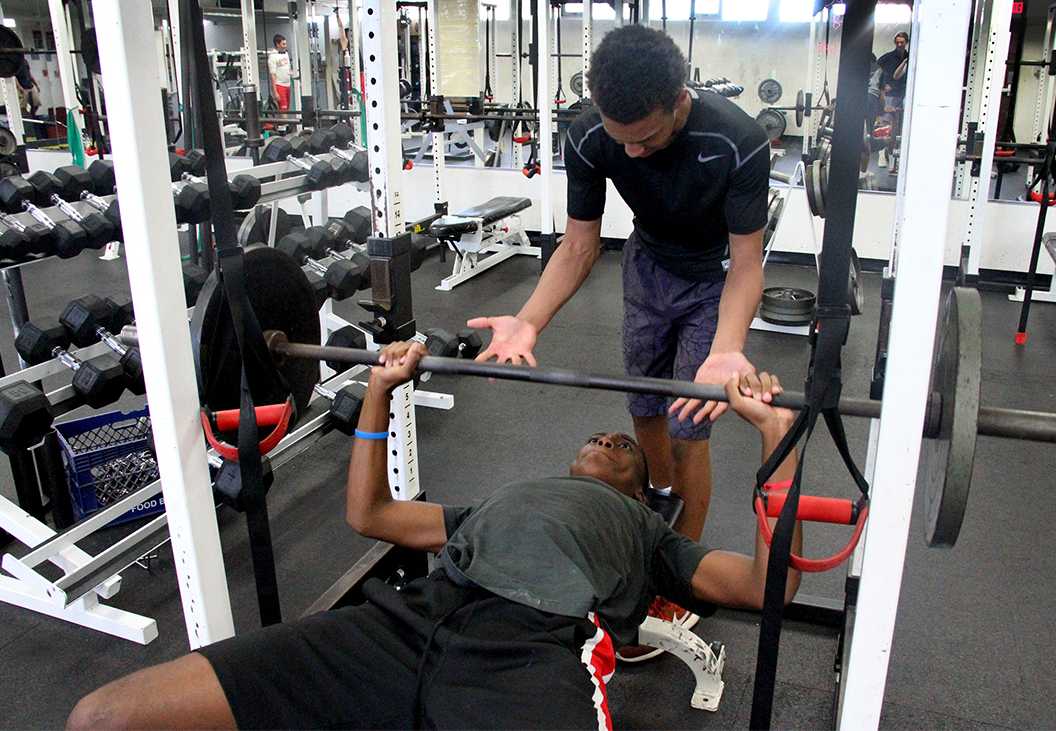 Photo by Isaac Myers ’18 - Sebastien Ribakare ’18 and Cameron Carr ’19 work out in the Weight Room during lunch Wednesday, April 6.