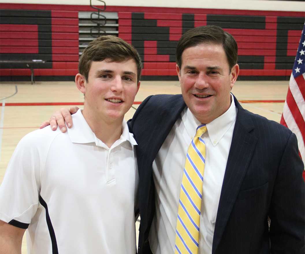 Photo by Bryce Owen ’17 | Joe Ducey ’17 and Arizona Governor Mr. Doug Ducey pose for a photo March 8 after the governor’s keynote address. Joe Ducey said he has learned valuable life lessons from his father being involved in politics.