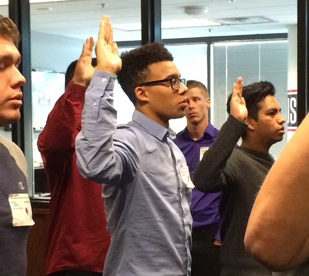 Photo Courtesy of Nico Nicholson ’17 | Nico Nicholson ’17 takes his oath to the United States Navy. Nicholson will forego college to enlist in the Navy and hopes to work in the nuclear division.