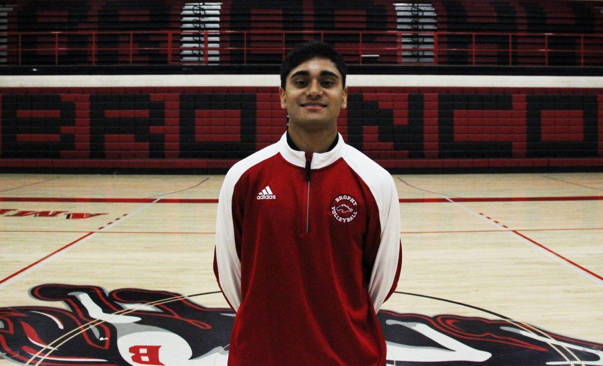 Photo Illustration by Hunter Franklin 19
Kinner Patel 18 poses for a photo in the Robinson Gymnasium. Kinner Patel who plays Volleyball and is  a key club member was nominated as a runner up for Man of the Year this year. 