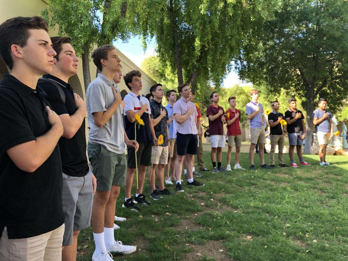 Brophy students recite the Pledge of Allegiance during a Sept. 11 memorial at Brophy College Preparatory on Sept. 11, 2019. Photo credit: Noah Lederer