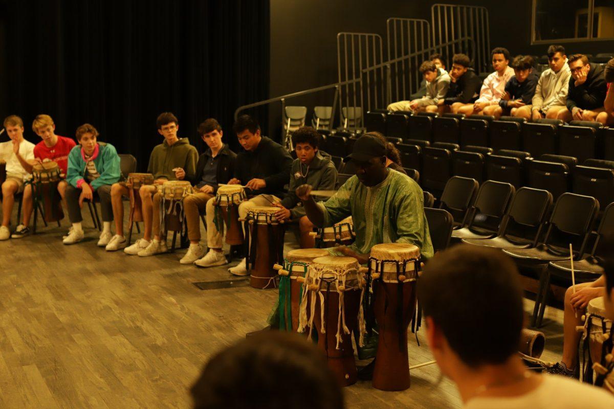 Photo+by+Mark+Rossbach+21%0ADethie+Sarr+%E2%80%98Pape%E2%80%99+Diouf+teaches+students+how+to+play+the+Sabar+drums+in+the+Black+Box+Theater.