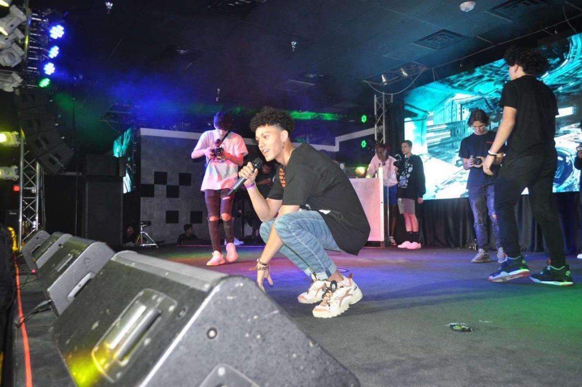 Photo courtesy of Caleb Musfeldt. Arizona rapper, Coolpicsofty, performs in front of a large audience.