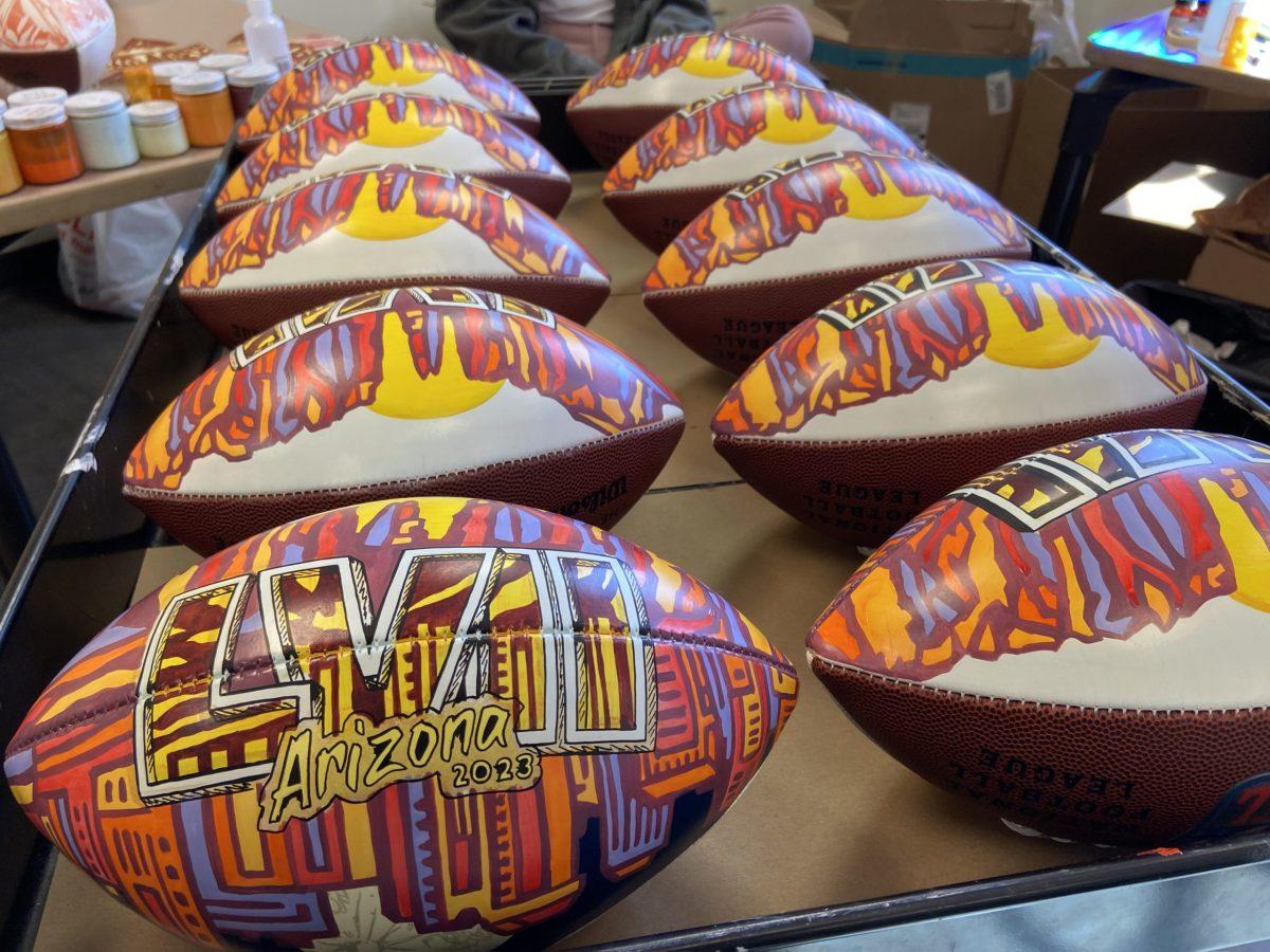 Art teacher designs footballs for Super Bowl LVII