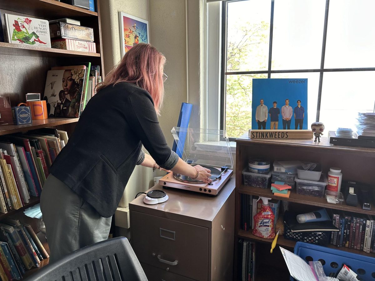 Dr. Kachorsky playing a weezer vinyl during first period. 