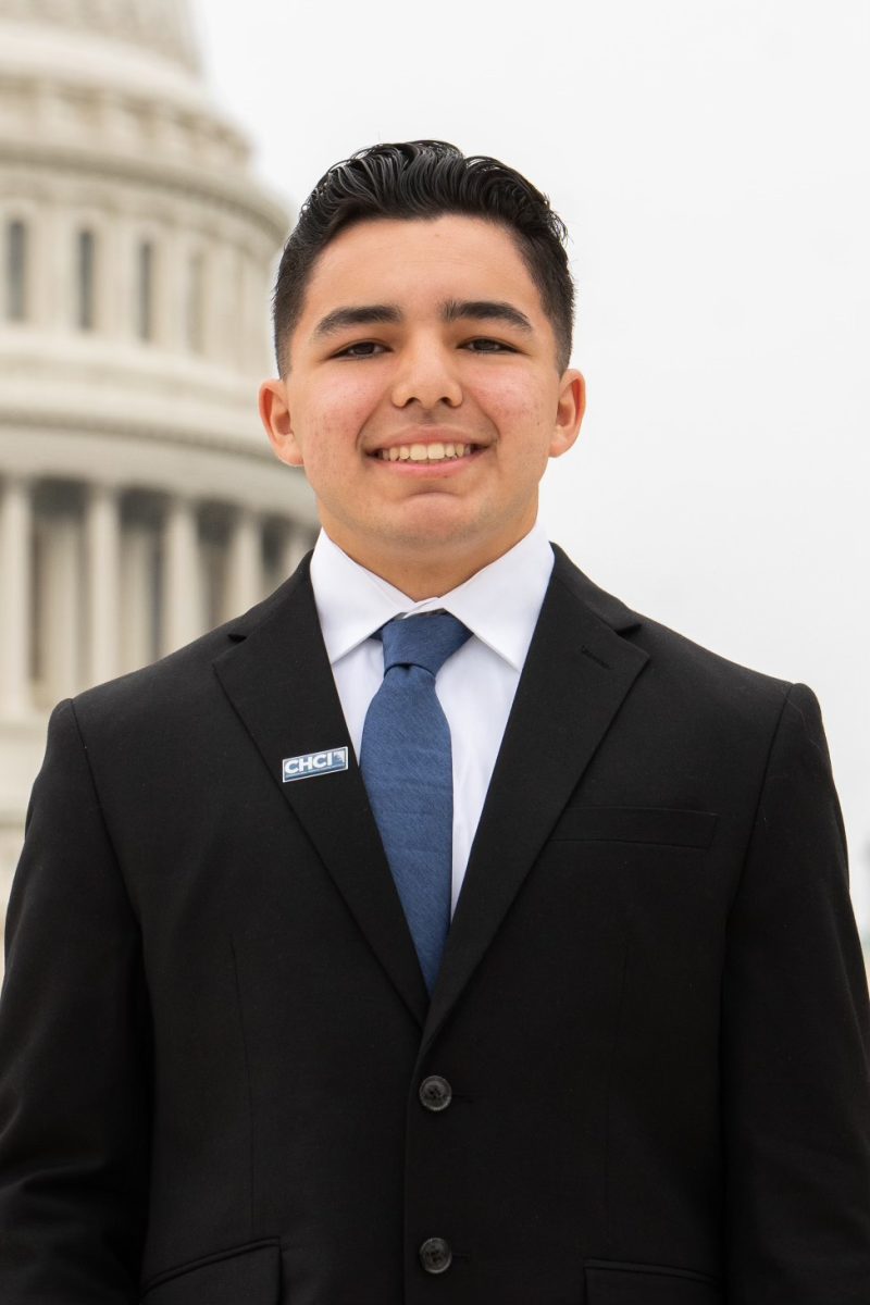 Jose Luis Avila III '25 poses in front of the Capitol Building.