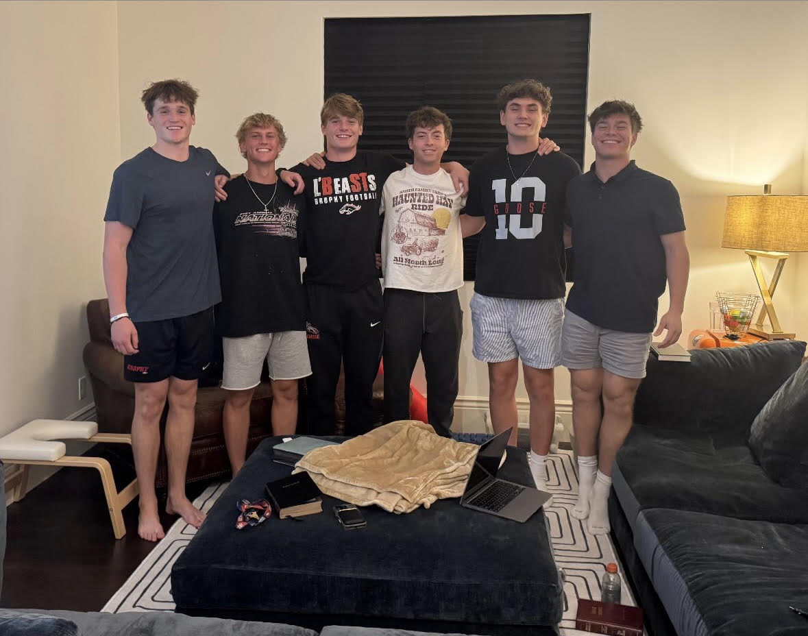 Bible study taking place at Caes Vanden Bosh's (far left) house Sunday Night.